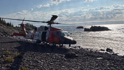 A 70-year-old hiker disappeared on Michigan’s remote Isle Royale for a week; backpackers helped find him injured and hypothermic before a Coast Guard helicopter hoisted him out